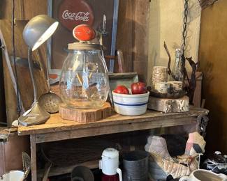 Antique butter churn, lamps, coke decor and pitchers