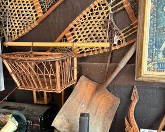 Vintage snow shoes and child wooden bike carrier