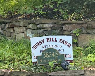 Street Sign signifies the entrance to Sunny Hill Farm