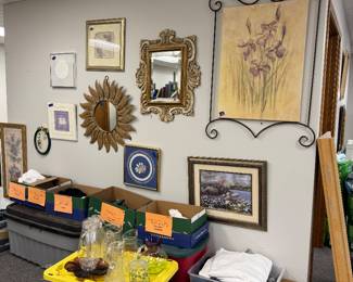 assorted mirrors and art