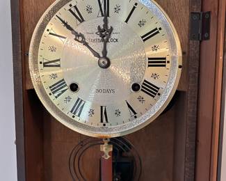 #18 Takeda Clock 30 day with winding key 27" tall $75.00