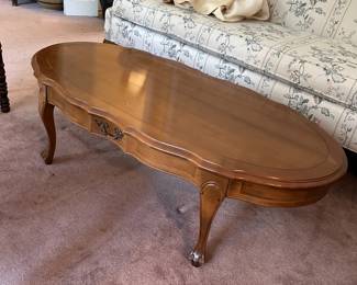 #9 Wood Oval Coffee Table - (has small stain) - 48x23x15 $45.00