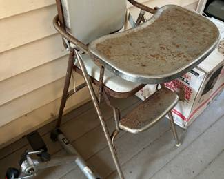 #108 Rusted Kids High Chair $20.00