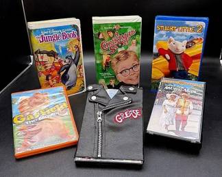 Vintage VHS and DVD Movies Featuring “Grease” In T-Bird Zip Up Leather Jacket Case