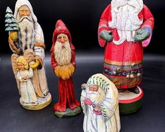 A Collection Of Four Decorative Santa Figures Featuring Two Silvestri Santas