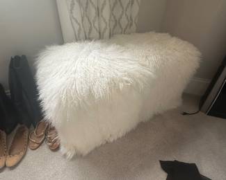(2) white furry ottomans