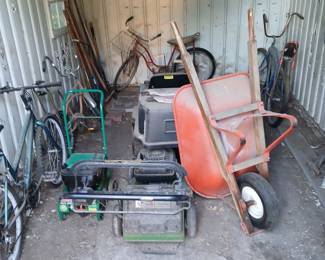 Bikes, Mower & Wheelbarrow Tags: vintage bicycles, banana seat bike, mountain bikes, push mower, gas mower, garden cart, hand truck dolly, wheelbarrow, shed tools Vintage bicycles including a classic banana-seat cruiser, plus mountain bikes, a push mower and gas mower, a green garden cart, hand truck dolly, and a well-used steel wheelbarrow with wood handles — great picks for collectors, gardeners, and DIYers alike.
