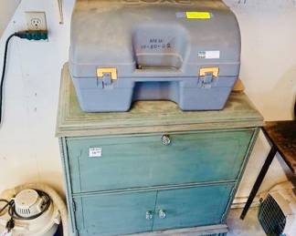 Antique Green Painted Cabinet with Glass Knobs Tags: antique painted wood cabinet, green farmhouse cabinet, glass drawer pulls, primitive storage cabinet, garage sale finds A charming antique wood cabinet in original green paint, featuring a locking top drawer and lower cabinet with glass knobs — great primitive storage for any room, priced at $15. A large storage tote sits on top for scale.