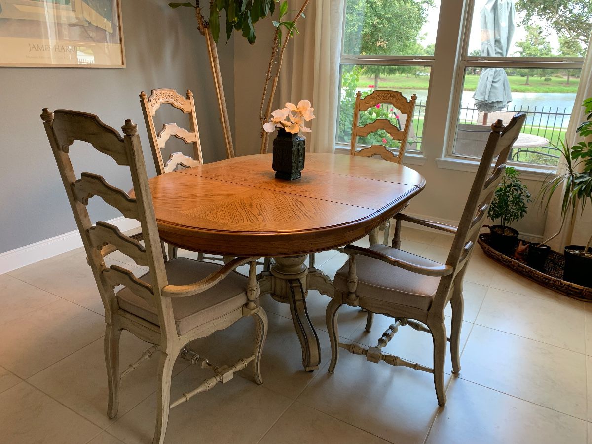 Solid wood dining table with four chairs