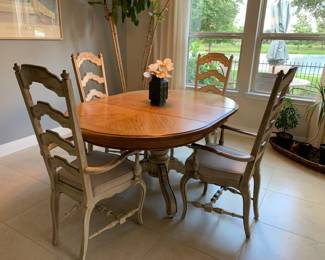 Solid wood dining table with four chairs