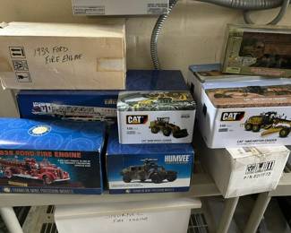 The Bradford Exchange Fire Truck in back of picture-new in box is valued at over $700! Many of these Models are in original boxes unopened.