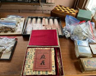 Beautiful games including a marble backgammon set and vintage mahjong sets.