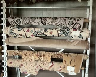 Assorted Designer Fabric Remnants on Display Rack