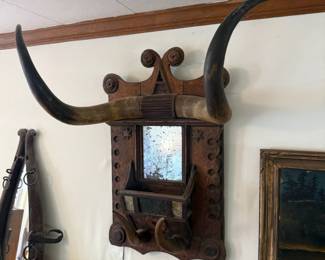 Incredible antique folk art bull horn mirror