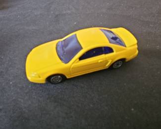 Maisto 1999 Yellow Ford Mustang GT Die-Cast Car