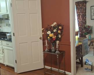 Glass Candlesticks with Floral Arrangement and Side Table