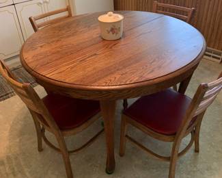 Oak Table and 4 chairs with red seats