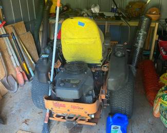 Packed out shed, including a tiger tub mower