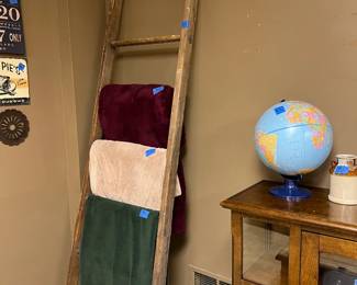 blanket ladder, plush throws , globe, signs, throw blankets