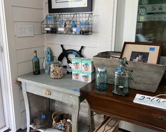 table, baskets, shell, artwork, table, signs