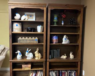 bookcases, books, bunnies, rug, decorations, vases, pictures, shells, initials