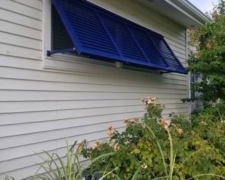 Aluminum blue Bahama shutter - beautiful!
