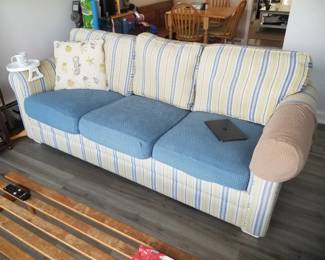 Cozy coastal couch is a sleeper sofa