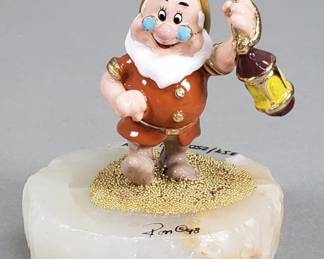 160 Rank 160 Lot 217 Ron Lee signed Disney sculptures on an onyx base
