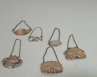 097 Rank 097 Lot 385 Six sterling silver bottle tags