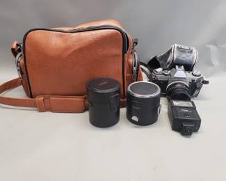 098 Rank 098 Lot 473 Canon AE1 film camera with bag and accessories