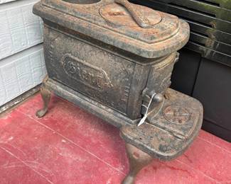 Antique wood burning stove Great condition Not rusted through anywhere 21” x 12” across x 18” tall   Must be able to move and load yourself