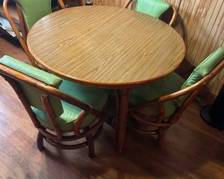 Vintage Bamboo / Rattan Dining Table Set Table is in excellent condition. Bottom cushions on chairs need to be fixed or replaced Table measures: 43” across x 27” tall Pickup in Hallettsville Must be able to move and load yourself
