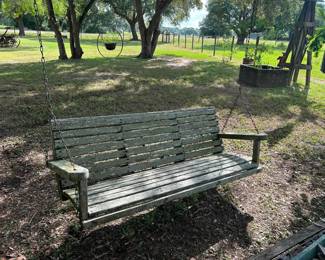 Wooden Bench Swing  Good condition but needs to be pressure washed 66” long x 22” deep   Must be able to move and load yourself