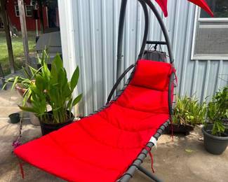 Hanging Chaise Lounge  Excellent condition!  Cushion and cover has been kept up and only pulled out when being used.   Must be able to move and load yourself