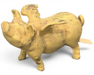 Flying metal pig statue
