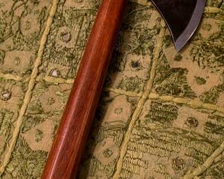 spike tomahawk/hatchet with a wooden handle.