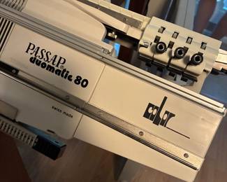 Passap Duomatic Swiss knitting machine w/ attachments, patterns and threads