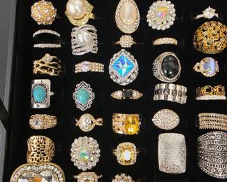 Vintage and fashion jewelry collection featuring rings, earrings, bracelets, necklaces, and accessories in gold and silver tone finishes