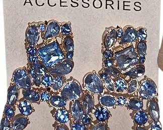 Deadstock and fashion jewelry collection featuring boho rings, novelty and enamel earrings, bracelets, necklaces, brooches, and accessories available