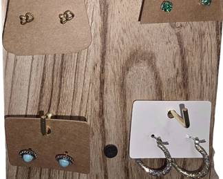 Deadstock and fashion jewelry collection featuring boho rings, novelty and enamel earrings, bracelets, necklaces, brooches, and accessories available
