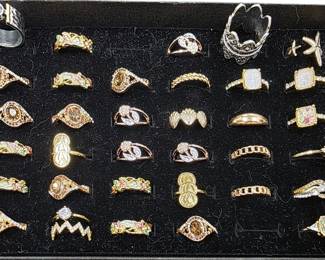 Deadstock and fashion jewelry collection featuring boho rings, novelty and enamel earrings, bracelets, necklaces, brooches, and accessories available