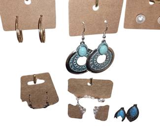 Deadstock and fashion jewelry collection featuring boho rings, novelty and enamel earrings, bracelets, necklaces, brooches, and accessories available