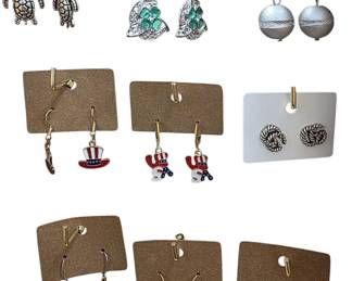 Deadstock and fashion jewelry collection featuring boho rings, novelty and enamel earrings, bracelets, necklaces, brooches, and accessories available