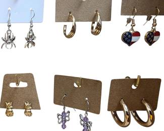 Deadstock and fashion jewelry collection featuring boho rings, novelty and enamel earrings, bracelets, necklaces, brooches, and accessories available