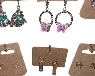 Deadstock and fashion jewelry collection featuring boho rings, novelty and enamel earrings, bracelets, necklaces, brooches, and accessories available