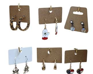 Deadstock and fashion jewelry collection featuring boho rings, novelty and enamel earrings, bracelets, necklaces, brooches, and accessories available