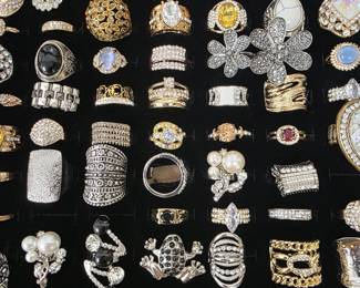 Vintage and fashion jewelry collection featuring rings, earrings, bracelets, necklaces, and accessories in gold and silver tone finishes