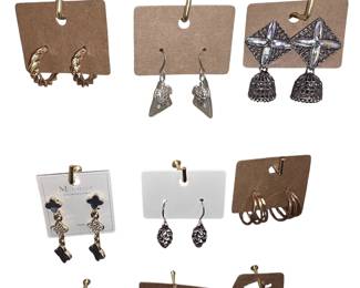 Deadstock and fashion jewelry collection featuring boho rings, novelty and enamel earrings, bracelets, necklaces, brooches, and accessories available