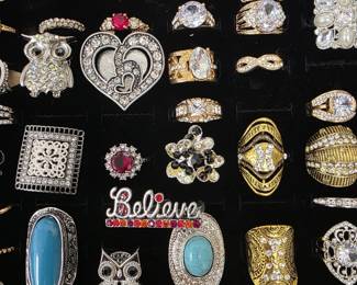 Vintage and fashion jewelry collection featuring rings, earrings, bracelets, necklaces, and accessories in gold and silver tone finishes