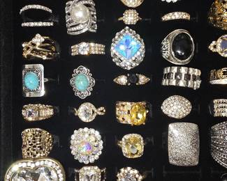 Vintage and fashion jewelry collection featuring rings, earrings, bracelets, necklaces, and accessories in gold and silver tone finishes